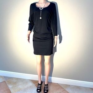 Sexy black dress. Ruched..size Medium